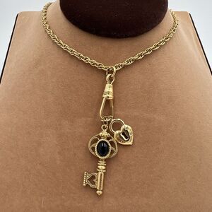 Vintage 1928 Gold Tone Charm Necklace Clip,Key,Heart, Lock 28" Longline
